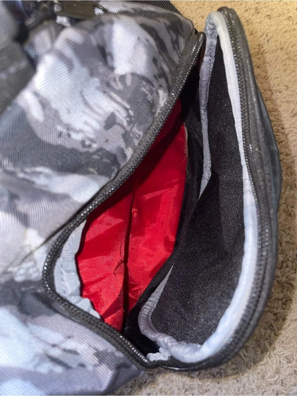 Under Armour Men’s Gray Camo Duffel Bag with Red Logo